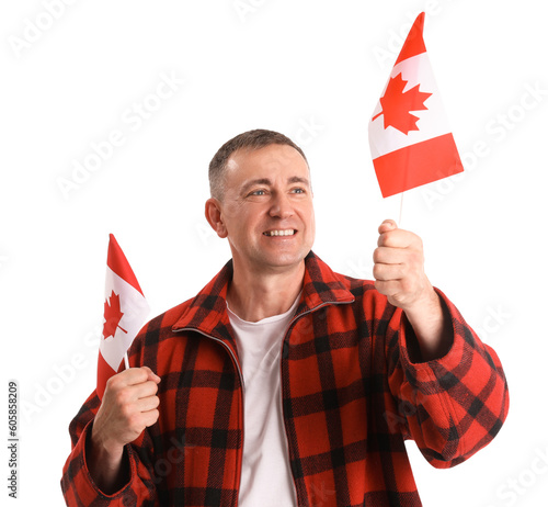 Mature man with flags of Ca...