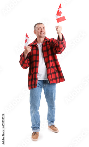Mature man with flags of Ca...