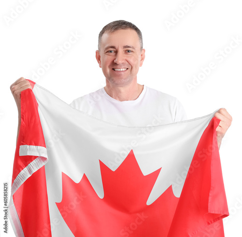 Mature man with flag of Can...