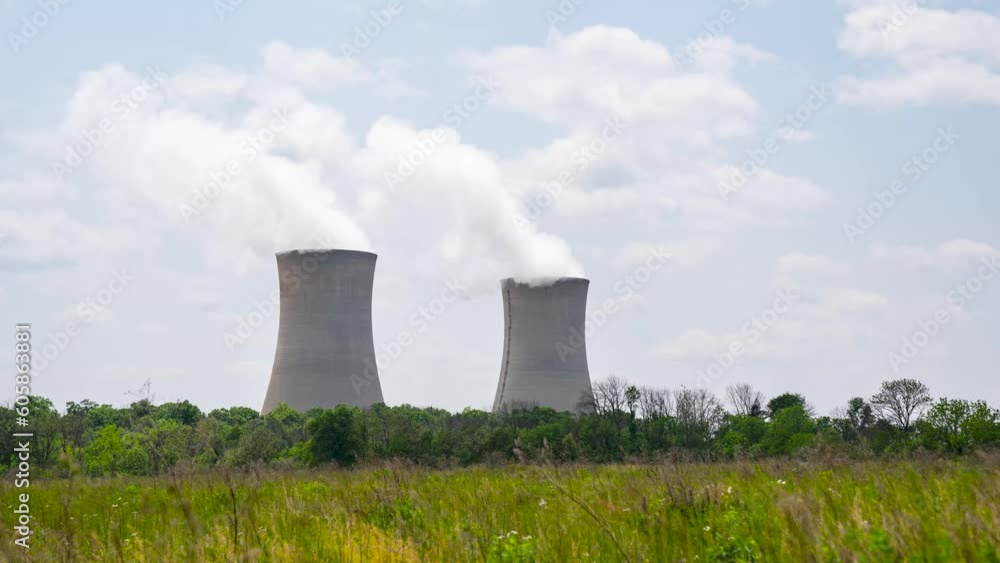 Time lapse of nuclear reactor Power Plant on a warm cloudy day in the suburbs Time lapse of nuclear reactor Power Plant on a warm cloudy day in the suburbs