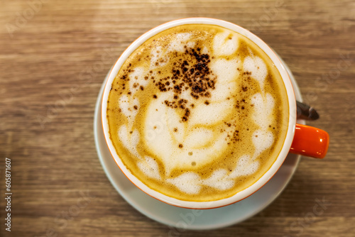 Creamy Coffee Delight  A Captivating High Angle Composition of Froth and Accents. Indulge in the Perfect Blend for Cafe Culture and Culinary Pleasures.