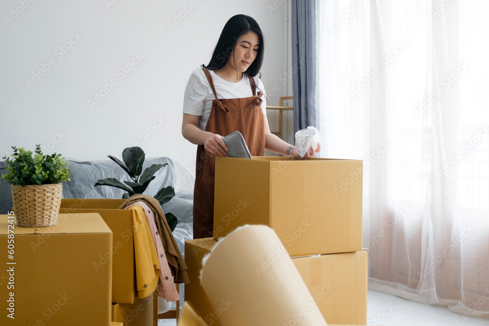 Modern female people in moving home apartment leisure indoor activity alone. Modern female people in moving home apartment leisure indoor activity alone.