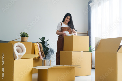 Modern female people in moving home apartment leisure indoor activity alone.