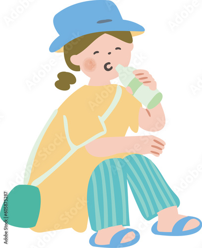 座ってお茶を飲む女性