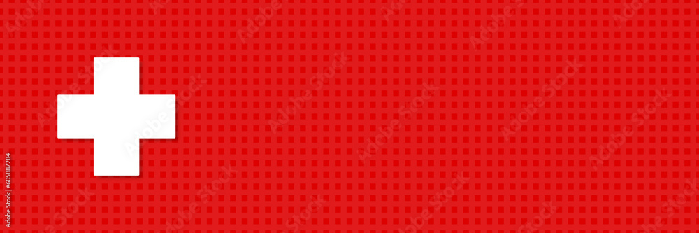 Fototapeta premium Medical cross on red background as a symbol of medical health. Frontal view, copy space. Health care and medical services concept.
