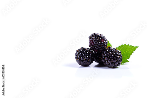 Fresh ripe blackberries isolated on white background with copy space. Created with Generative AI Technology