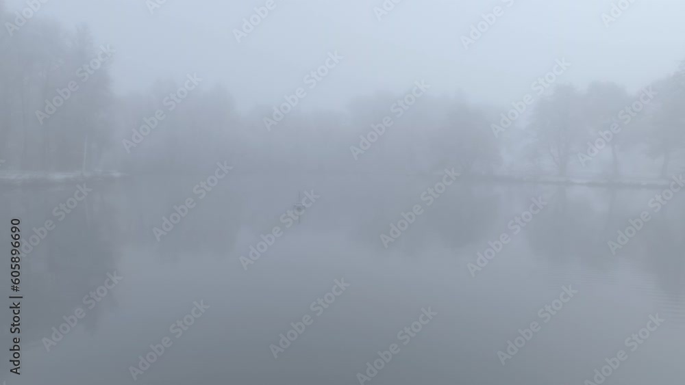 Atmospheric Landscape Of A Misty Lake During Winter Season. Aerial Drone Shot Atmospheric Landscape Of A Misty Lake During Winter Season. Aerial Drone Shot