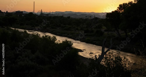 Timelapse of the Santa Clara River running through Santa Clarita, Ca. with Six Flags Magic Mountain in the distant background. photo