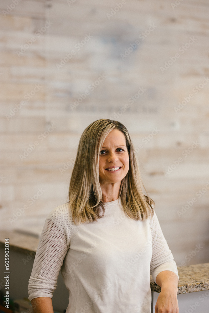 Female doctor of chiropractic medicine in her office