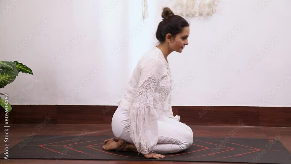 Video of a woman performing Shashankasana Breathing Video of a woman performing Shashankasana Breathing