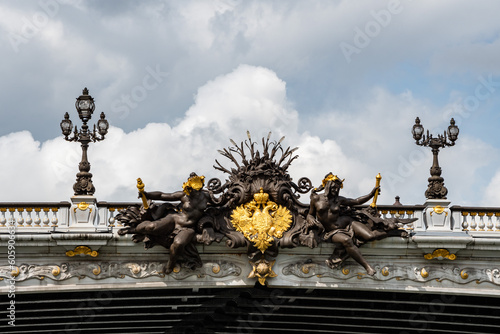Nymphs of the Seine with the arms of Paris from the Alexandre III bridge from the Seine, in Paris, France