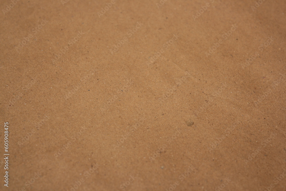 Brown paper texture close detailed background, shiny brown paper surface Brown paper texture close detailed background, shiny brown paper surface