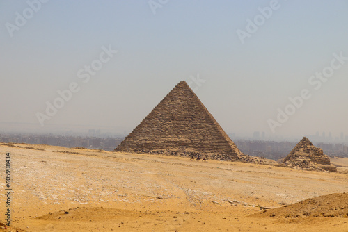 small pyramid of giza and ruins nearby on a sunny day