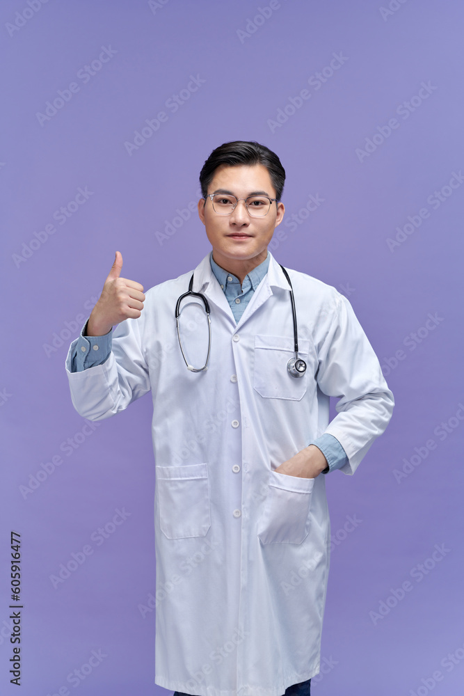 portrait of smiley medical doctor showing thumbs up portrait of smiley medical doctor showing thumbs up