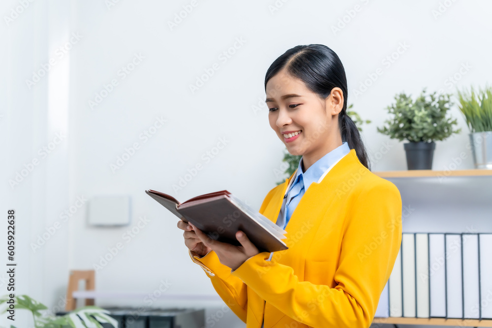 Young busy asian business woman manager, lawyer doing bookkeeping audit graph documents checking Bank Reconciliation, Base Stock, Last Invoice Price, Freight, Drop Product or Drop Section Decisions