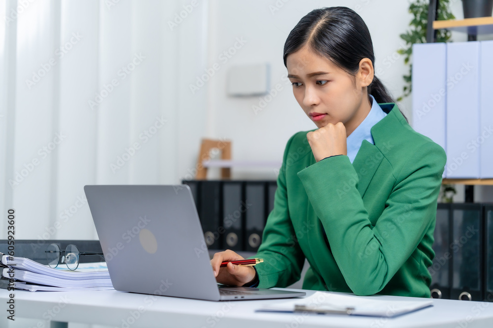 Young busy asian business woman manager, lawyer doing bookkeeping audit graph documents checking Bank Reconciliation, Base Stock, Last Invoice Price, Freight, Drop Product or Drop Section Decisions Young busy asian business woman manager, lawyer doing bookkeeping audit graph documents checking Bank Reconciliation, Base Stock, Last Invoice Price, Freight, Drop Product or Drop Section Decisions