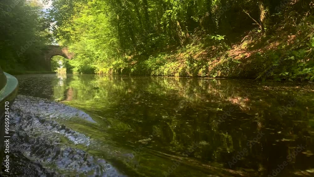 Shropshire Union canal waterway narrowboat, or barge POV footage on a sunny summer day. Shropshire Union canal waterway narrowboat, or barge POV footage on a sunny summer day.