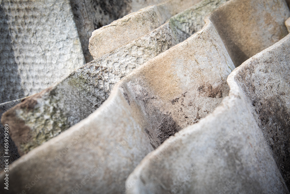 Old roofing slate in a pile. Asbestos, harmful to humans and the environment. Texture Old roofing slate in a pile. Asbestos, harmful to humans and the environment. Texture