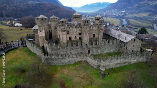 one of the most beautiful and famous medieval castles of Italy Castello di Fenis in Valle d'Aosta , aerial drone view photo