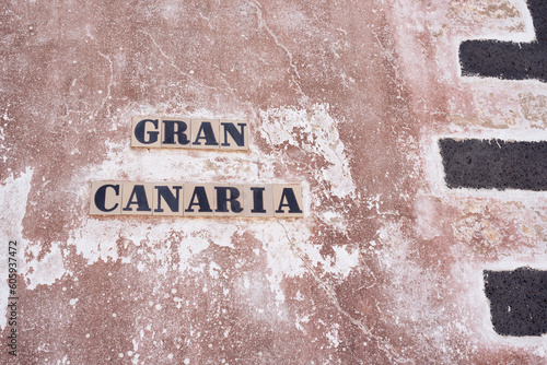 Gran Canaria poster on typical wall of villa de teguise