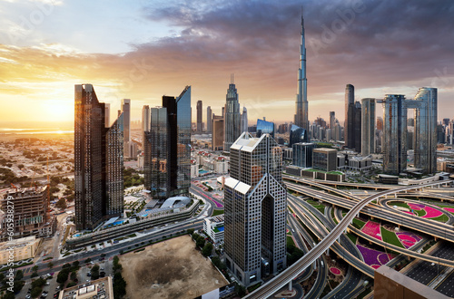 Photography Dramatic sunrise over Dubai skyline panorama with Burj Khalifa and luxury skyscr