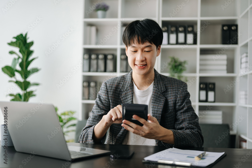 Woman freelancer is working her job on computer tablet and laptop Doing accounting analysis report real estate investment data, Financial at office. Woman freelancer is working her job on computer tablet and laptop Doing accounting analysis report real estate investment data, Financial at office.