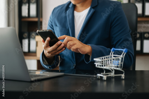 Cart Online Shopping concept. businessman hand using smart phone, tablet payments and holding credit card online shopping, omni channel, computer