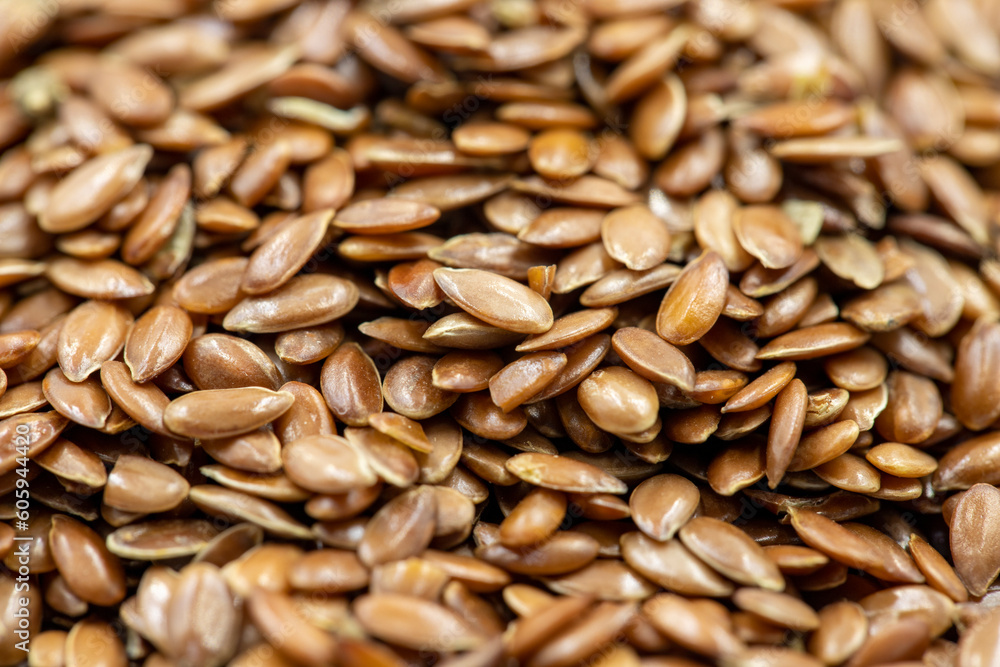 Flax seeds background or texture. Flaxseed or linseed. Cereals. Healthy food. Close up Flax seeds background or texture. Flaxseed or linseed. Cereals. Healthy food. Close up