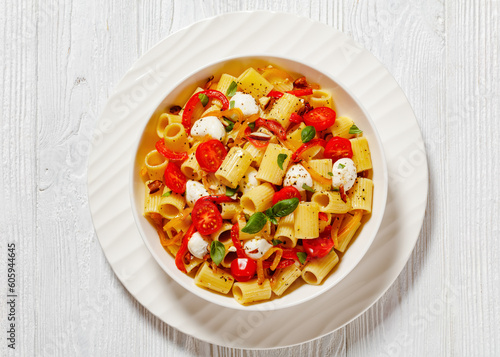 pepper tomato mozzarella pasta salad in bowl