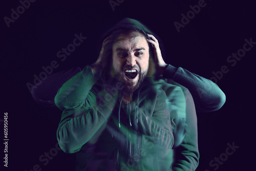 Bild auf Leinwand Man suffering from paranoia on dark background