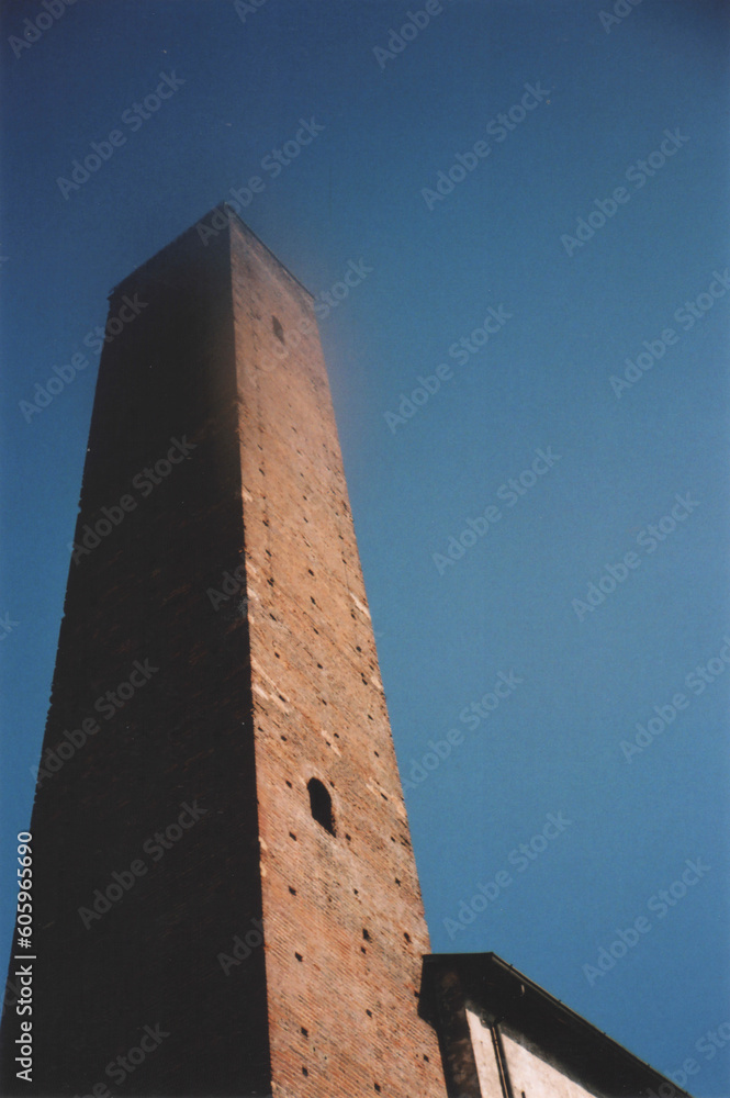 Medieval Tower in a Sunny Winter Day View from Below. Pavia City Center, Italy. Film Photography