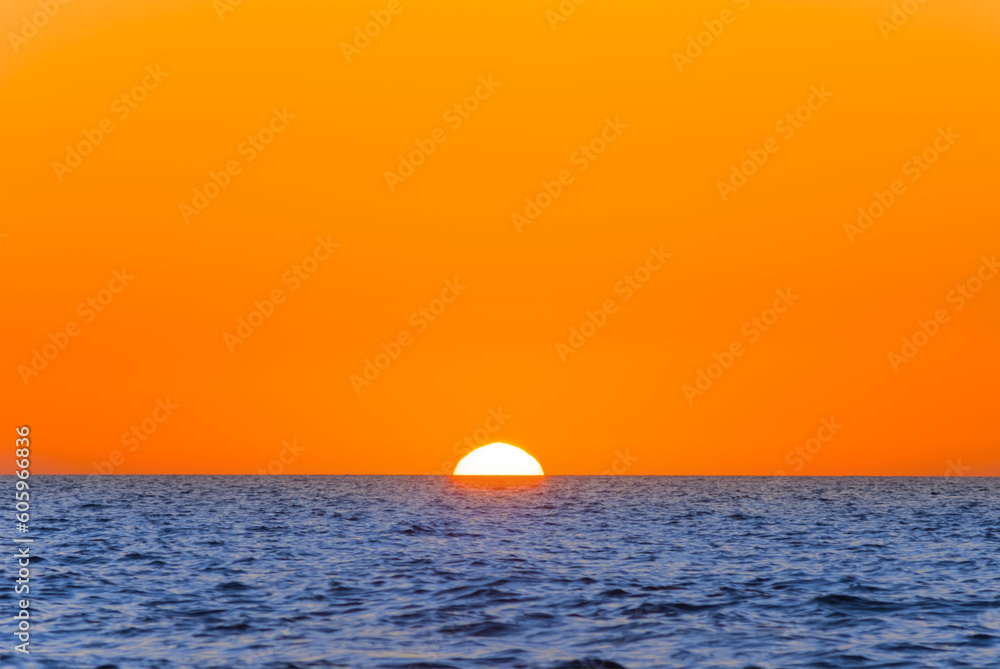red sunset over the calm sea, natural marine background