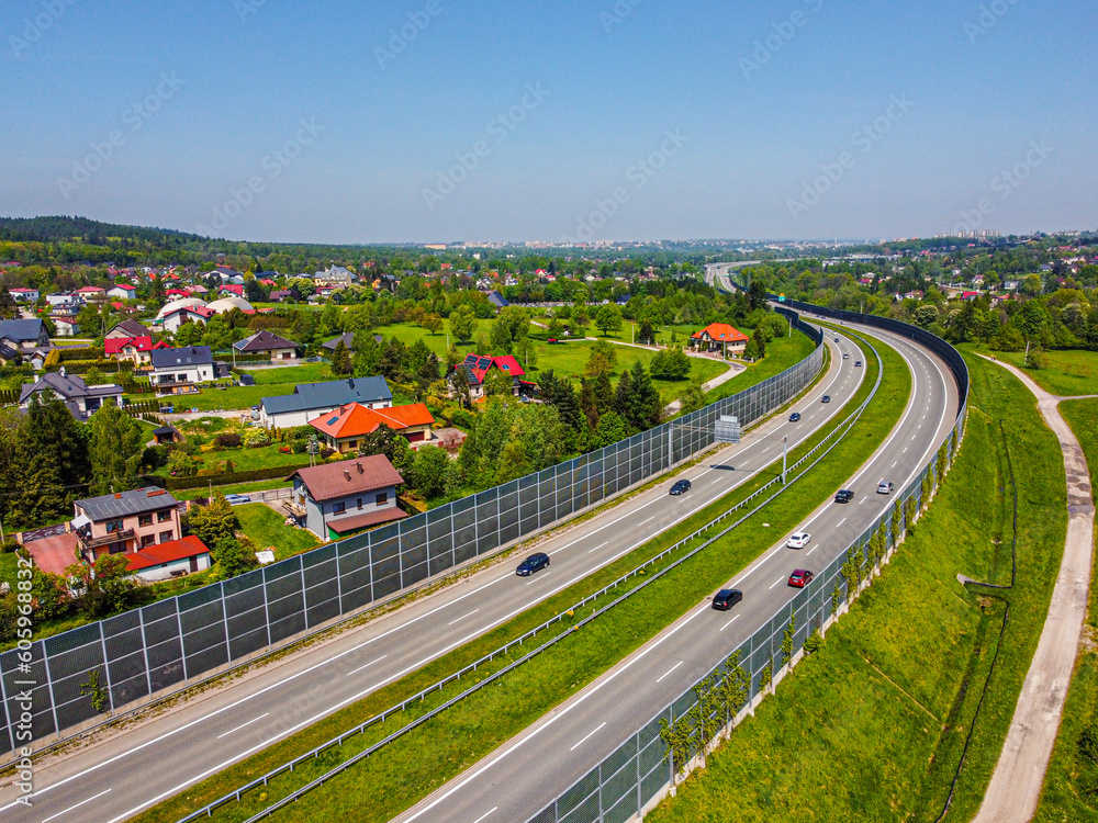 Drone view of a two-lane highway. Traveling by car