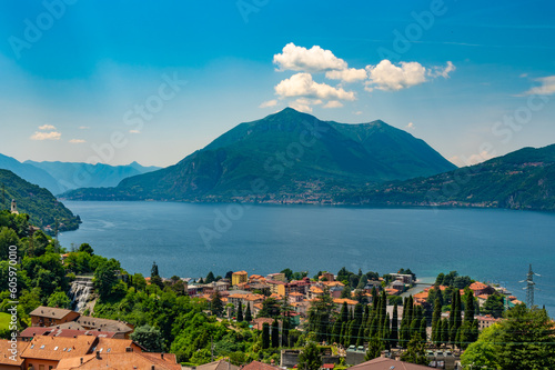 View of Lake Como and the town of Bellano, with the village, the waterfall and the mountains overlooking the lake. 