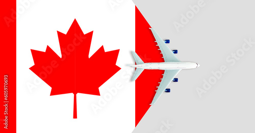 plane model with canadian flag on background, immigration concept