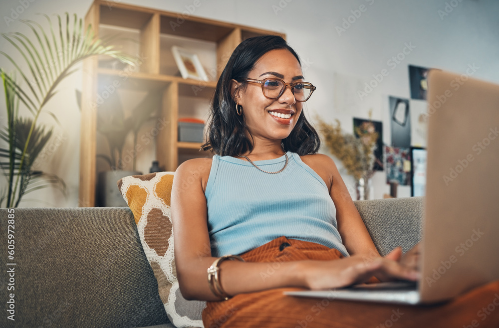 © Haas/peopleimages.com - Laptop, young woman and working from home with a smile writing for website. Happy freelancer, living room sofa and female person blogging on a lounge couch and typing a blog post on a computer © Haas/peopleimages.com - Laptop, young woman and working from home with a smile writing for website. Happy freelancer, living room sofa and female person blogging on a lounge couch and typing a blog post on a computer
