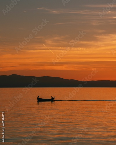 Vertical shot of a seascape at sunset in Makarska, Croatia © Ante Bebic/Wirestock Creators