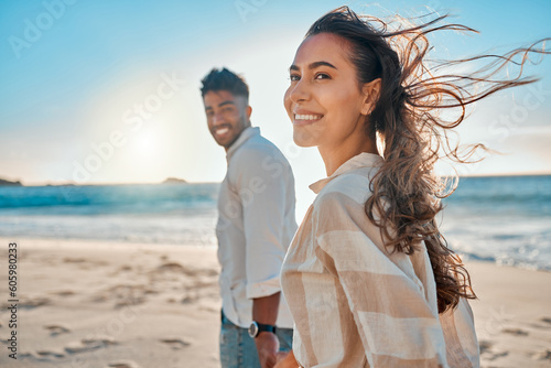 Love, happy and holding hands with couple on beach for honeymoon, relax and travel vacation. Summer, happiness and smile with man and woman walking on date for romance, care and support together