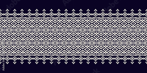 Ethnic abstract ikat art. Seamless pattern in tribal, folk embroidery, and Mexican style. Aztec geometric art ornament print. Design for carpet, wallpaper, clothing, wrapping, fabric, cover, textile.