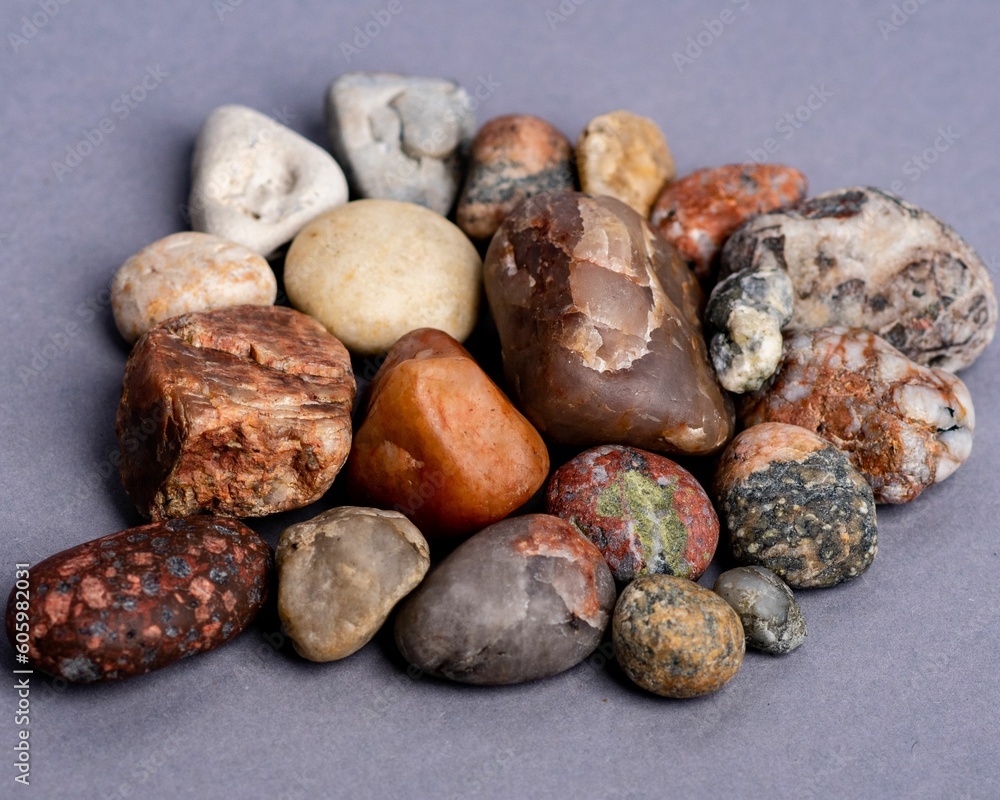 Closeup of holistic stones isolated in gray background Closeup of holistic stones isolated in gray background