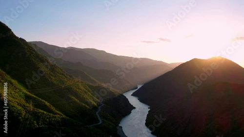 Timelapse of a sunset at the Drin river in Albania near Koman. photo