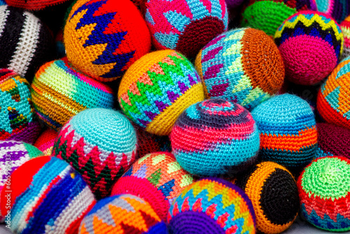 Multi-colored/coloured crocheted wool balls, Otavalo, market stall, Ecuador