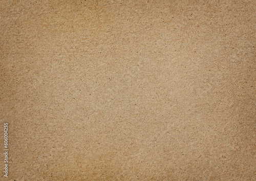 Background full frame old brown paper parchment texture with a slightly rough texture