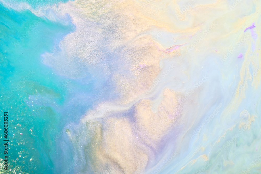 Abstract versicoloured background. Luxury fluid art. Waves, splashes and blots of acrylic alcohol ink, paints under water. Multicolored marble texture