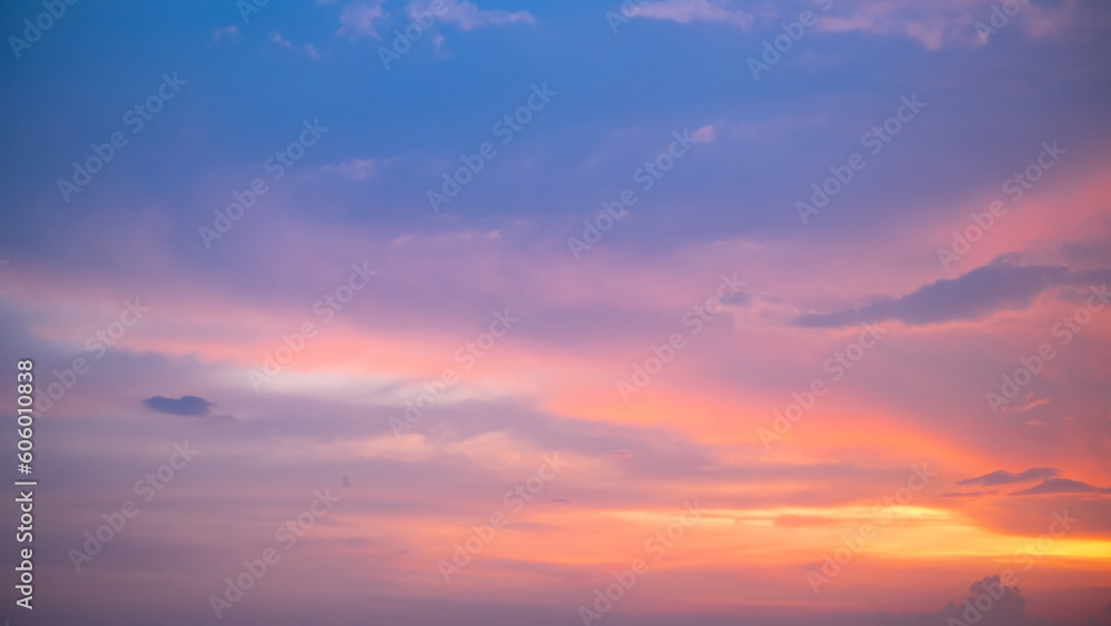 beautiful , luxury soft gradient orange gold clouds and sunlight on the blue sky perfect for the background, take in everning,Twilight