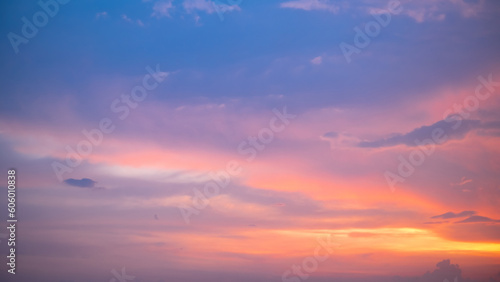 beautiful , luxury soft gradient orange gold clouds and sunlight on the blue sky perfect for the background, take in everning,Twilight