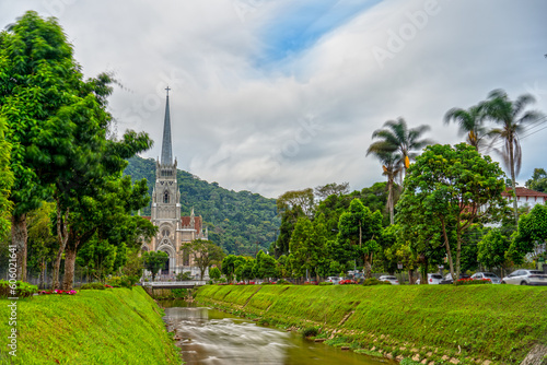 Petropolis Cathedral Facade with Flowing River and Abstract Time-lapse Sky photo