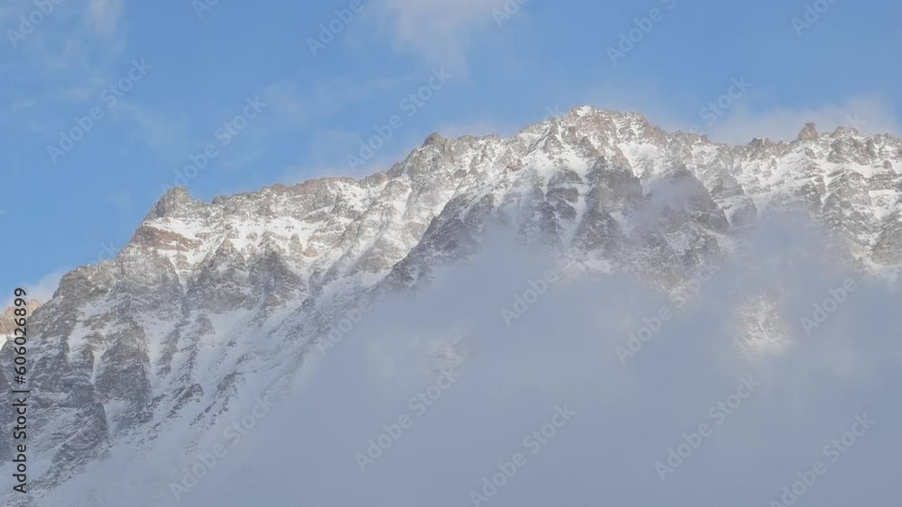 Snowy Alps with clouds Snowy Alps with clouds