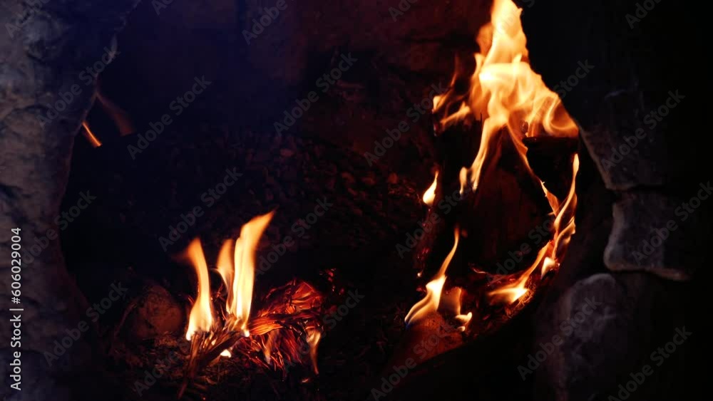 A traditional clay oven with fire at a nomads' hut in the Sahara desert of Morocco. Oven to cook meals and bake bread. Authentic nomadic lifestyle. 4k footage. A traditional clay oven with fire at a nomads' hut in the Sahara desert of Morocco. Oven to cook meals and bake bread. Authentic nomadic lifestyle. 4k footage.