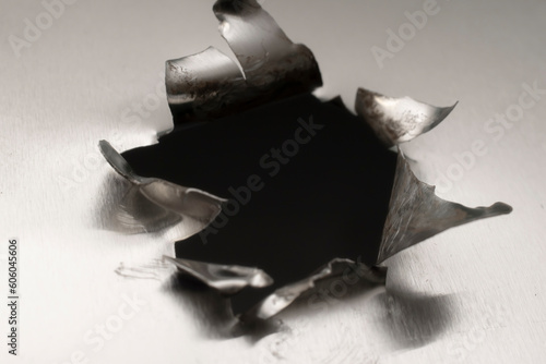 hole in metal plate, background or texture